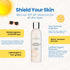 Sunscreen bottle with promotional text about SPF 40+ sunscreen for all skin types.